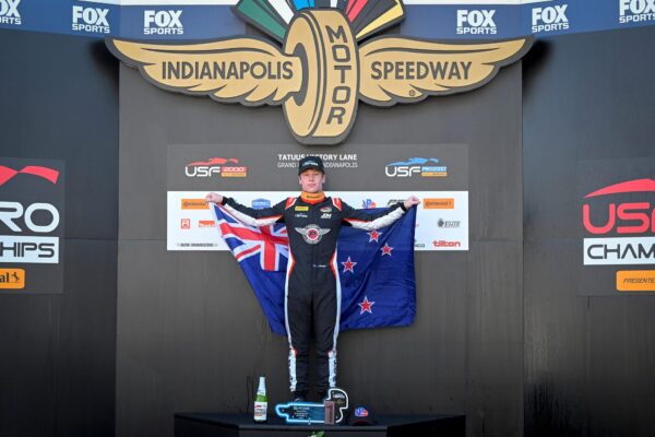 Douglas_on_the_top_step_with_the_NZ_flag_jacob_douglas_motorsport_2026_usf_pro_2000